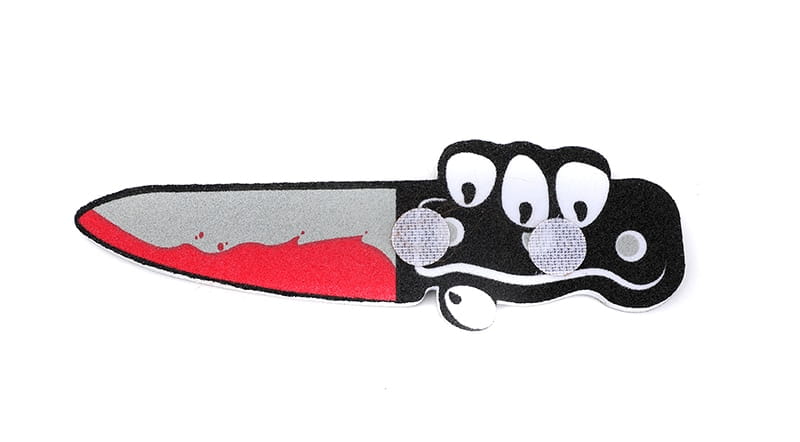 Cartoon knife with googly eyes and fake blood for Halloween pet costume fun.