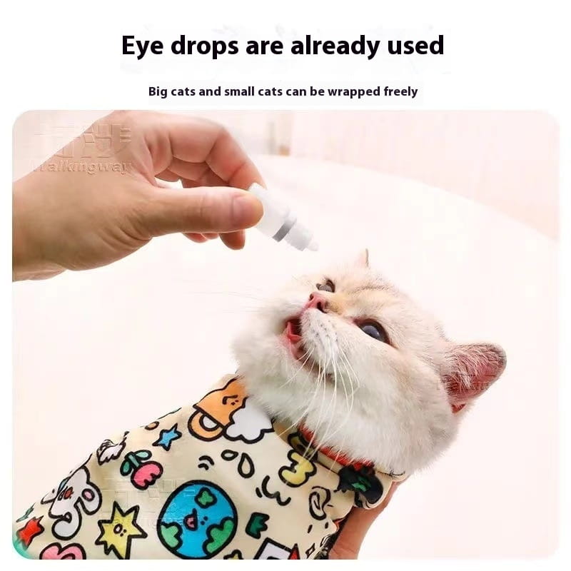 Cat receiving eye drops beside Cartoon Printed Cat Cloth Cosmetic Bag for pet lovers.