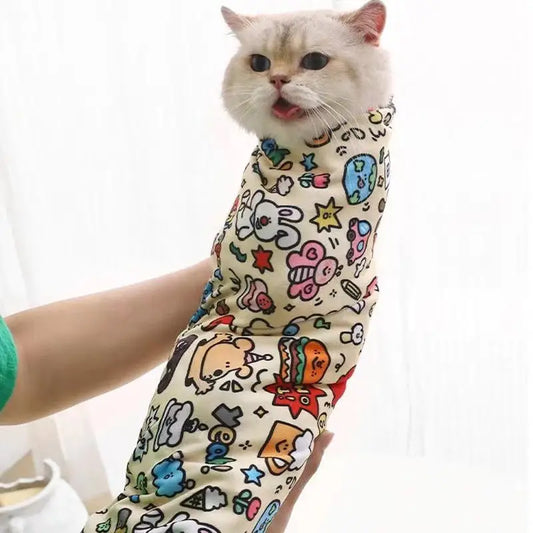 Cat in cartoon-patterned wrap showcasing Cartoon Printed Cat Cloth Cosmetic Bag for Pet Lovers