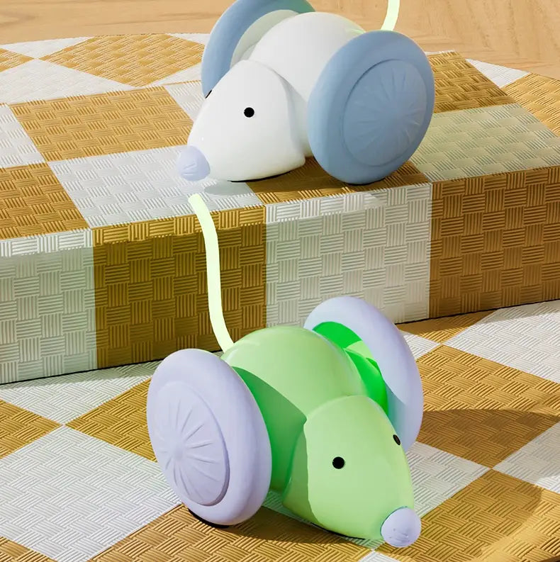 Two toy mice with wheel-like ears for the Cat Running Car Stuffy Electric Toy.