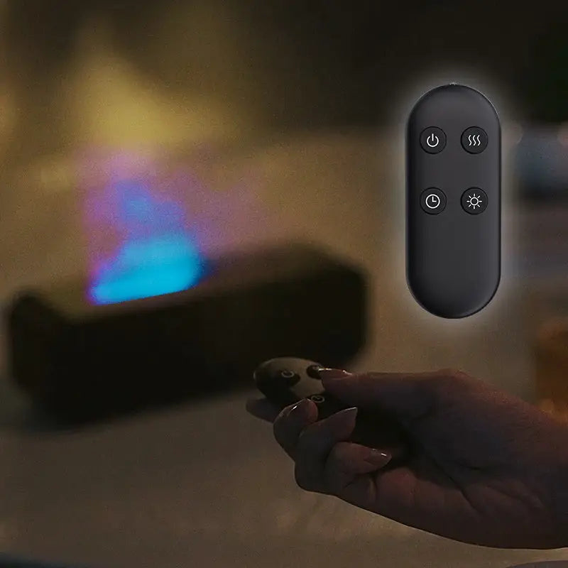 Black remote control with four buttons for Flame Dynamic Aroma Diffuser usage