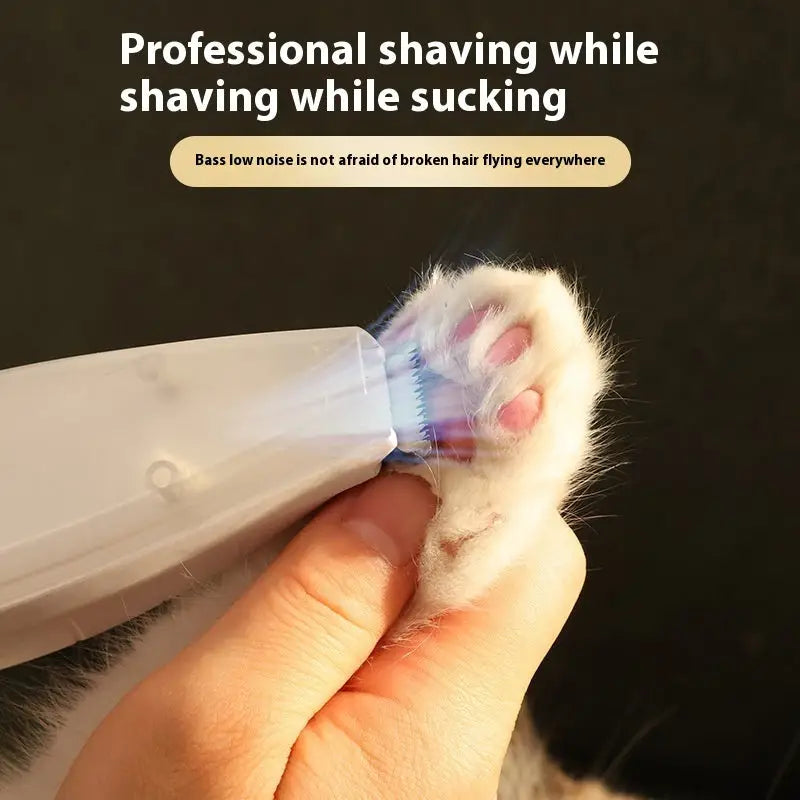 Cat paw being shaved with a Pet Shaver featuring vacuum cleaner bass noise