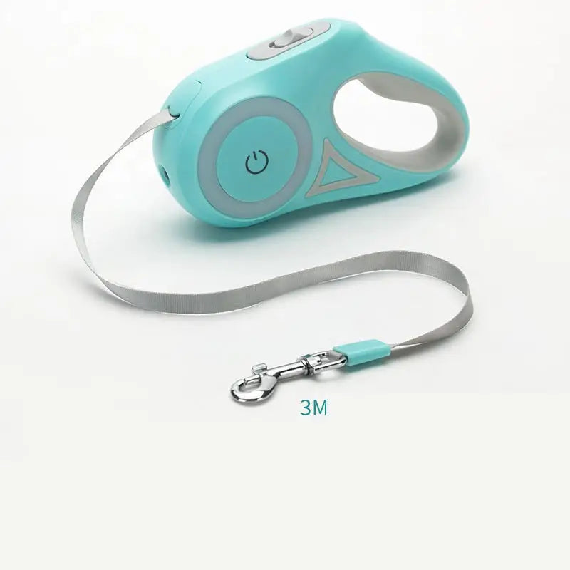 Retractable teal dog leash with automatic collar spotlight feature for safe walks