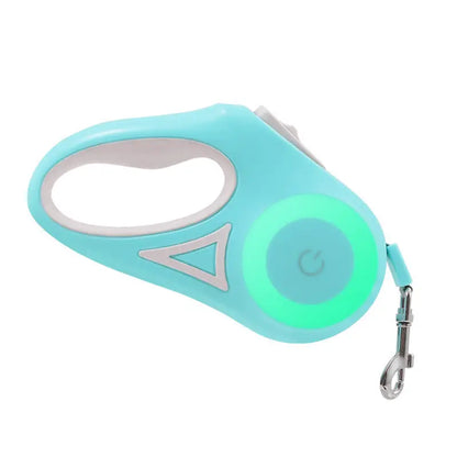 Teal retractable dog leash featuring automatic collar spotlight for safety in low light