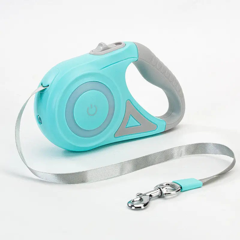 Retractable teal and gray dog leash featuring automatic collar spotlight feature